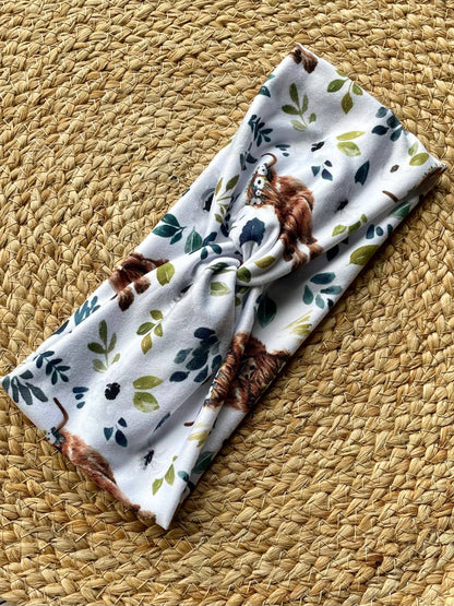 Highland Cow White Floral Knit Twist Headband